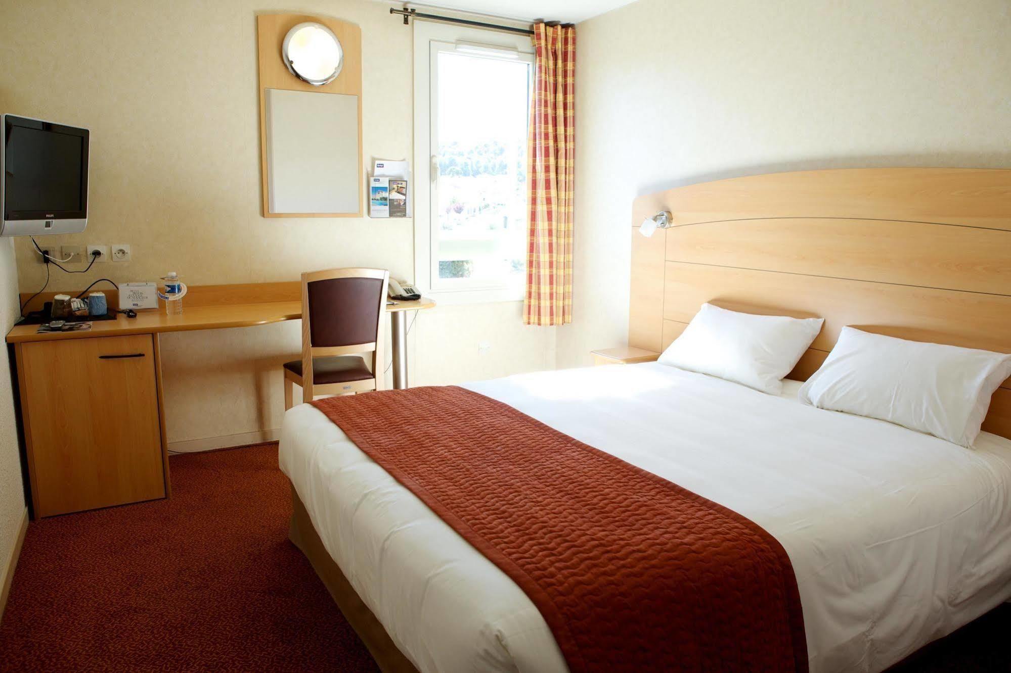 Brit Hotel Marseille Aeroport Mirabeau Rom bilde