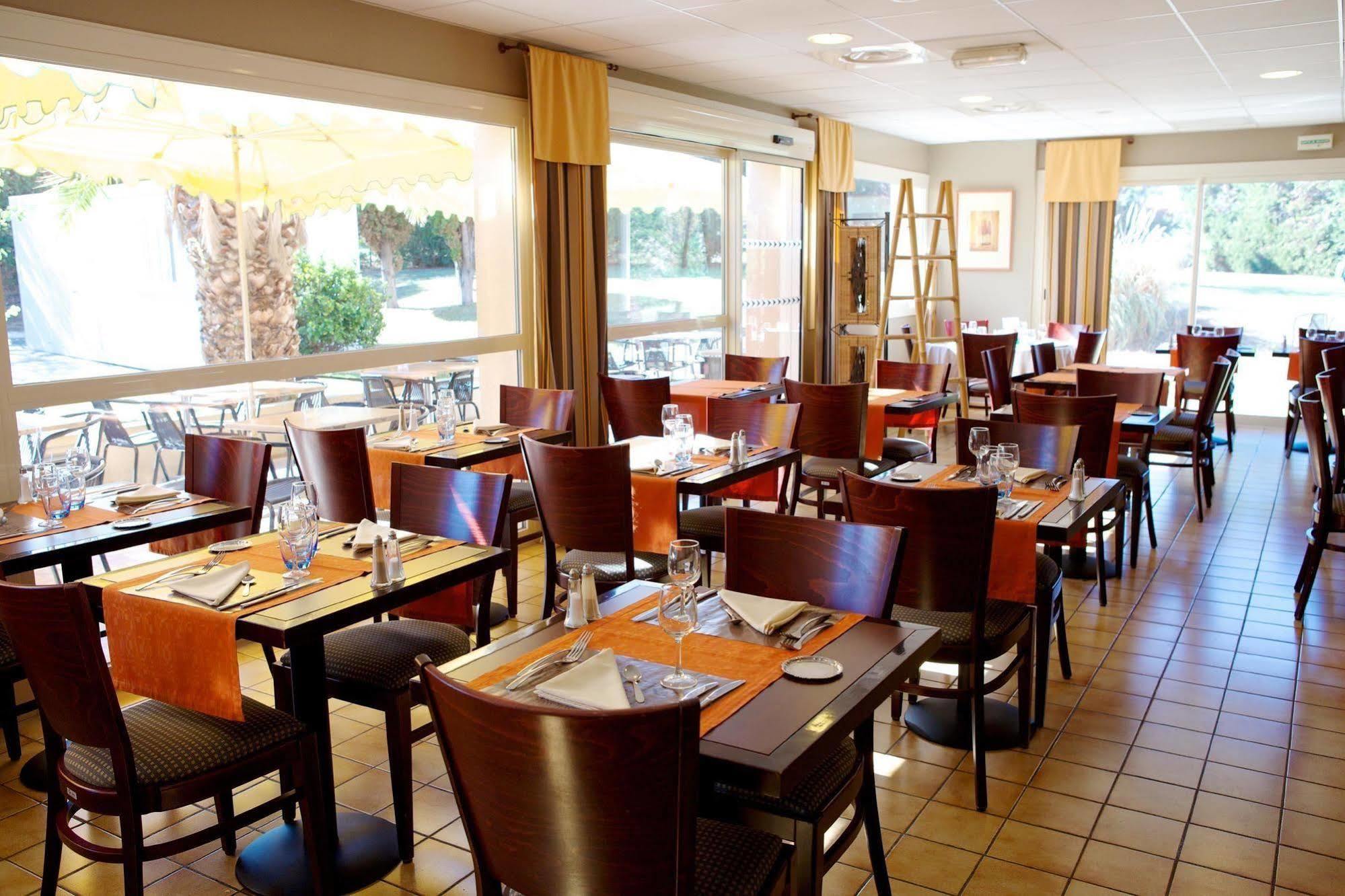 Brit Hotel Marseille Aeroport Mirabeau Restaurant bilde